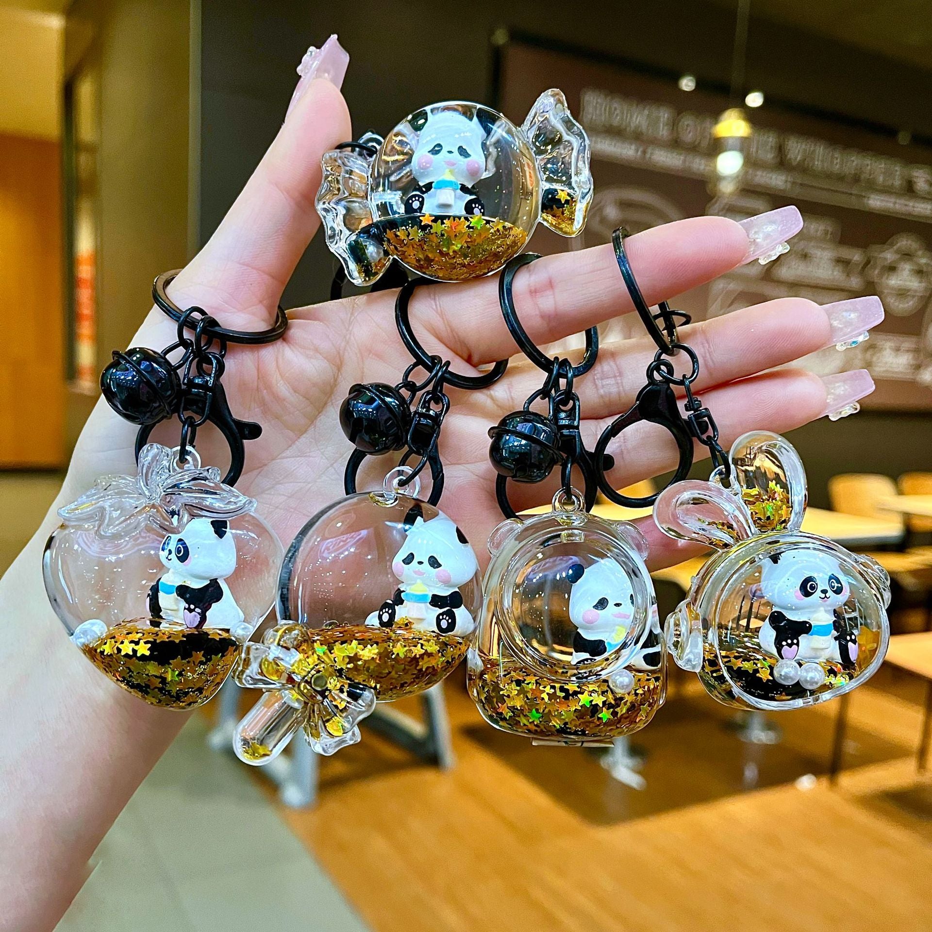 Wholesale Black gold floating cartoon cute panda Liquid Keychains