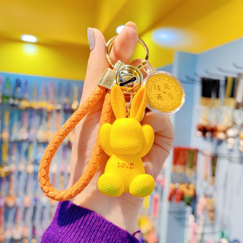 Caricatura de dibujos animados de dibujos animados de caricatura con llaves de conejo