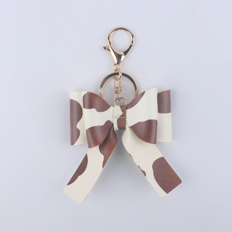 Wholesale Cartoon Aztec Color Bow Leather Keychain
