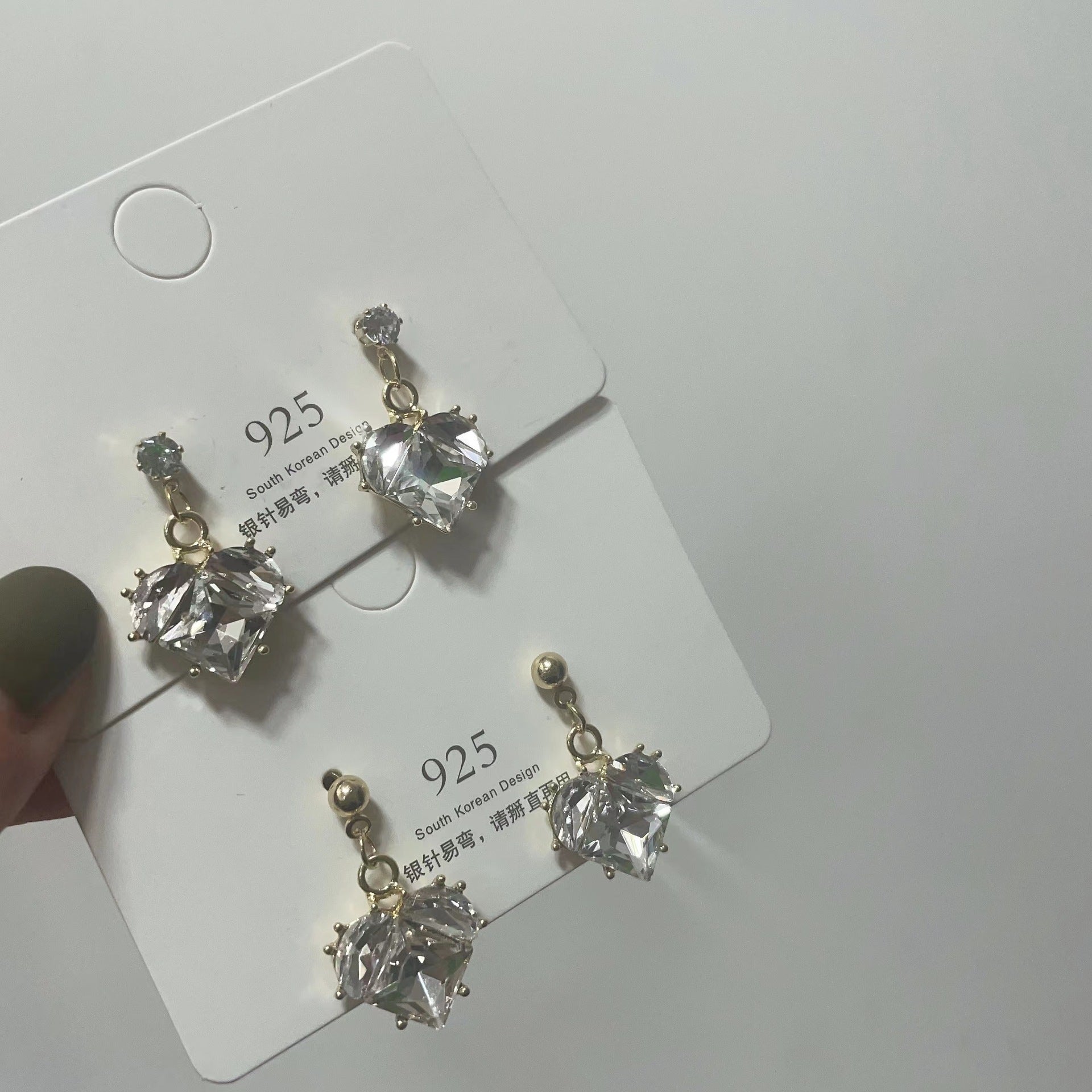 Wholesale Romantic heart-shaped peach pink earrings, fresh and sweet, simple and cool, super shiny earrings