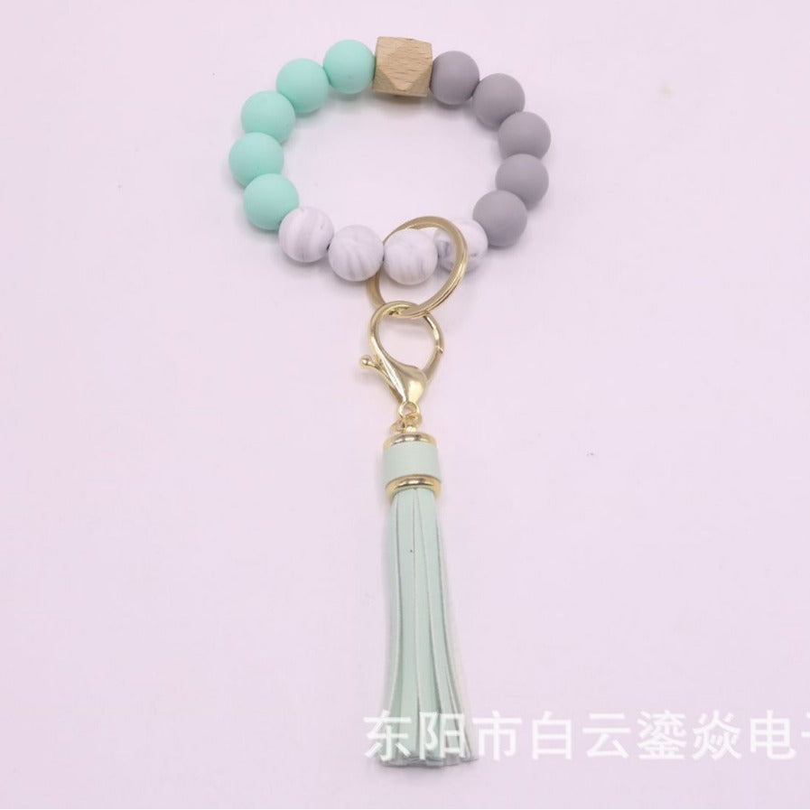 Wholesale 10pcs/pack  Silicone leather tassel bracelet Wristlet Keychain
