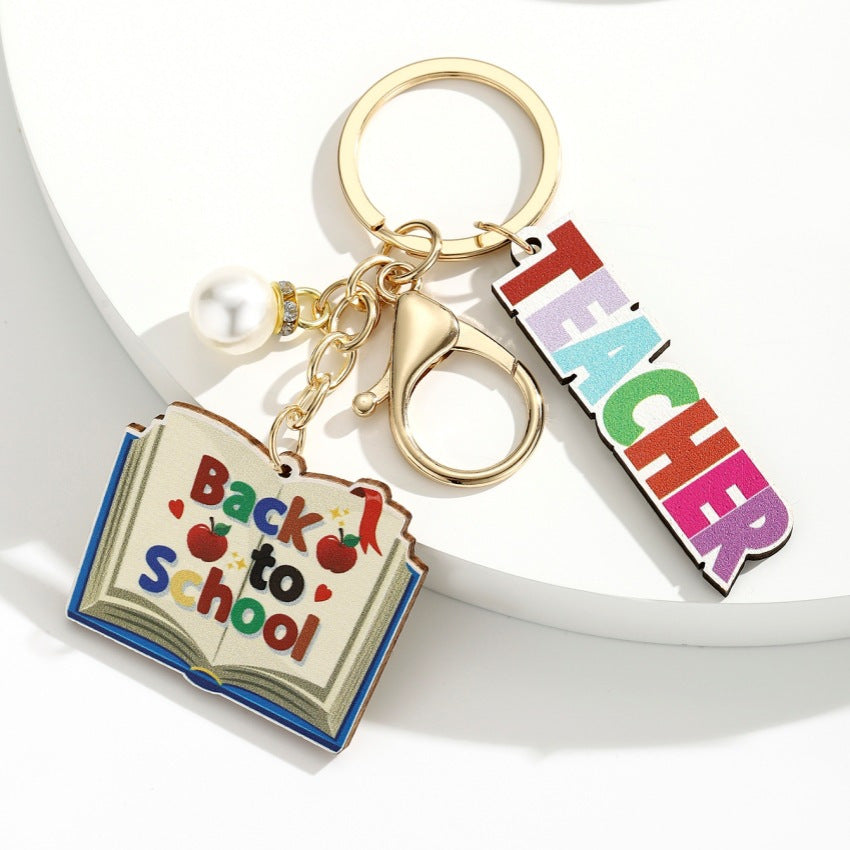 Wholesale Campus style graduation season wooden book keychain
