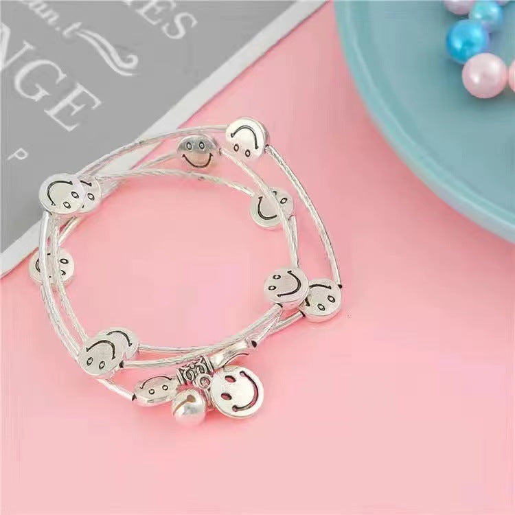 Wholesale Multi-Layered Triple Circle Bell Smiley Alloy Bracelet