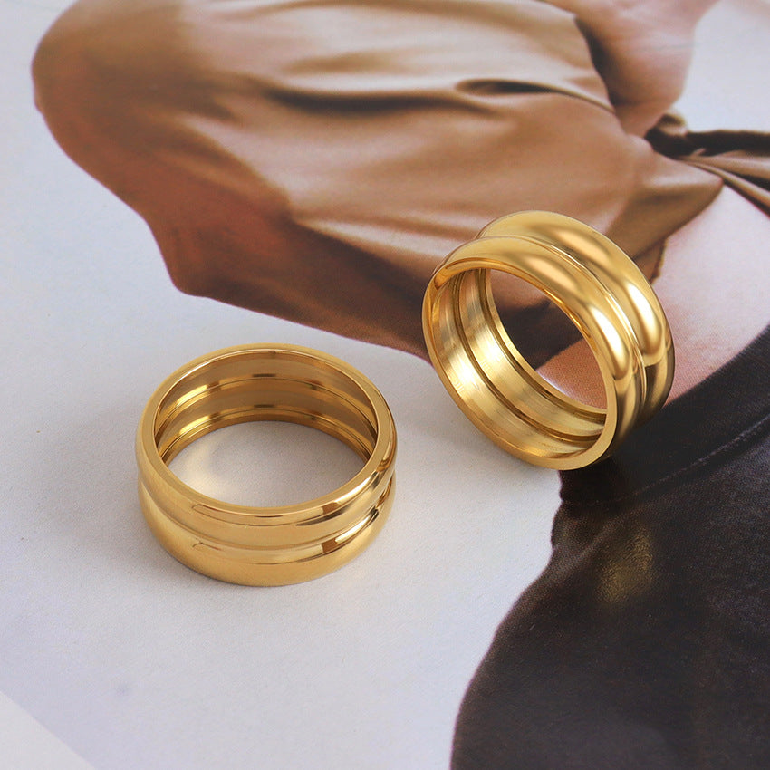 Wholesale Inlaid Pear-shaped Zircon Titanium Steel Thin Circle Open Ring