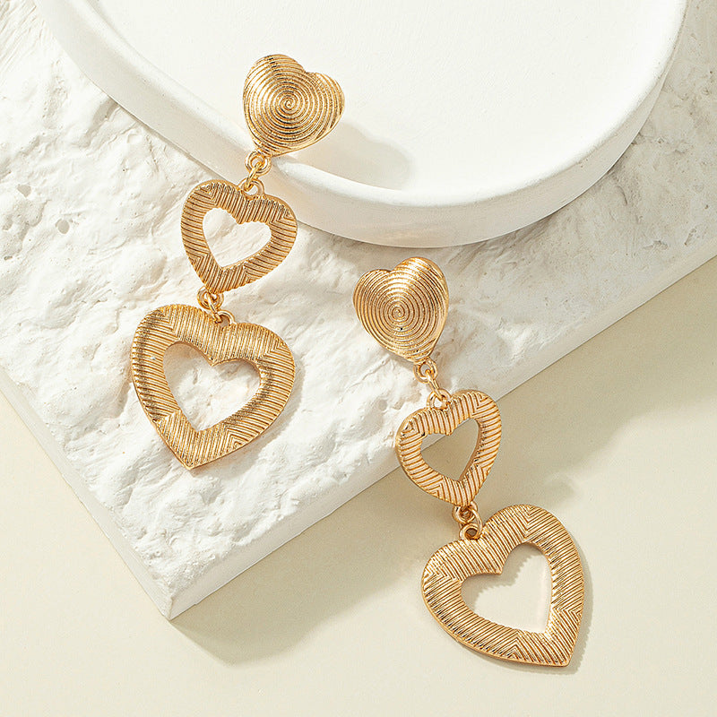 Wholesale Valentine's Day Alloy Textured Heart-shaped Long Earrings