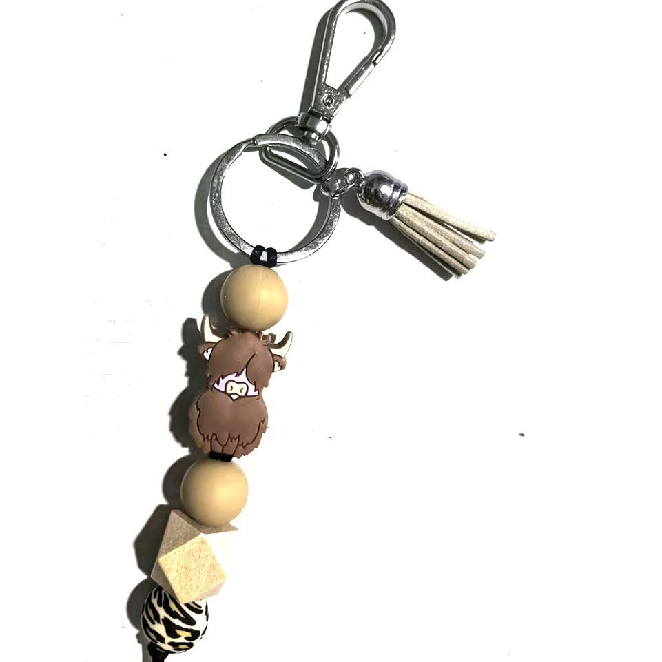 Wholesale Silicone Bead Cartoon Cow Keychain Bag Charm For Couple Birthday Gift And Everyday Use
