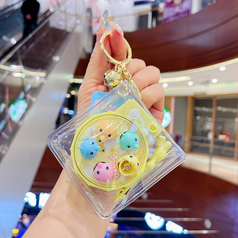 Llavero de la máquina de pesca giratoria de PVC al por mayor