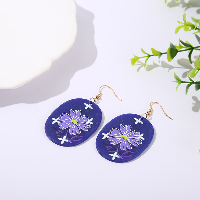 Pendientes de flores de margaritas de color púrpura acrílico al por mayor