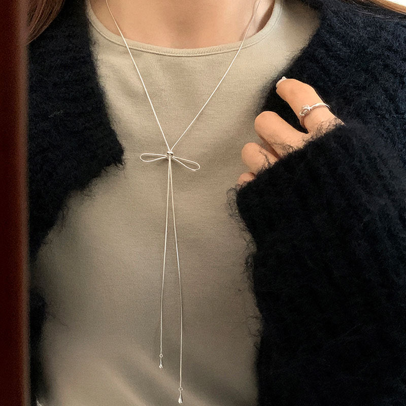Wholesale Simple bow pull-out long necklace sweater chain