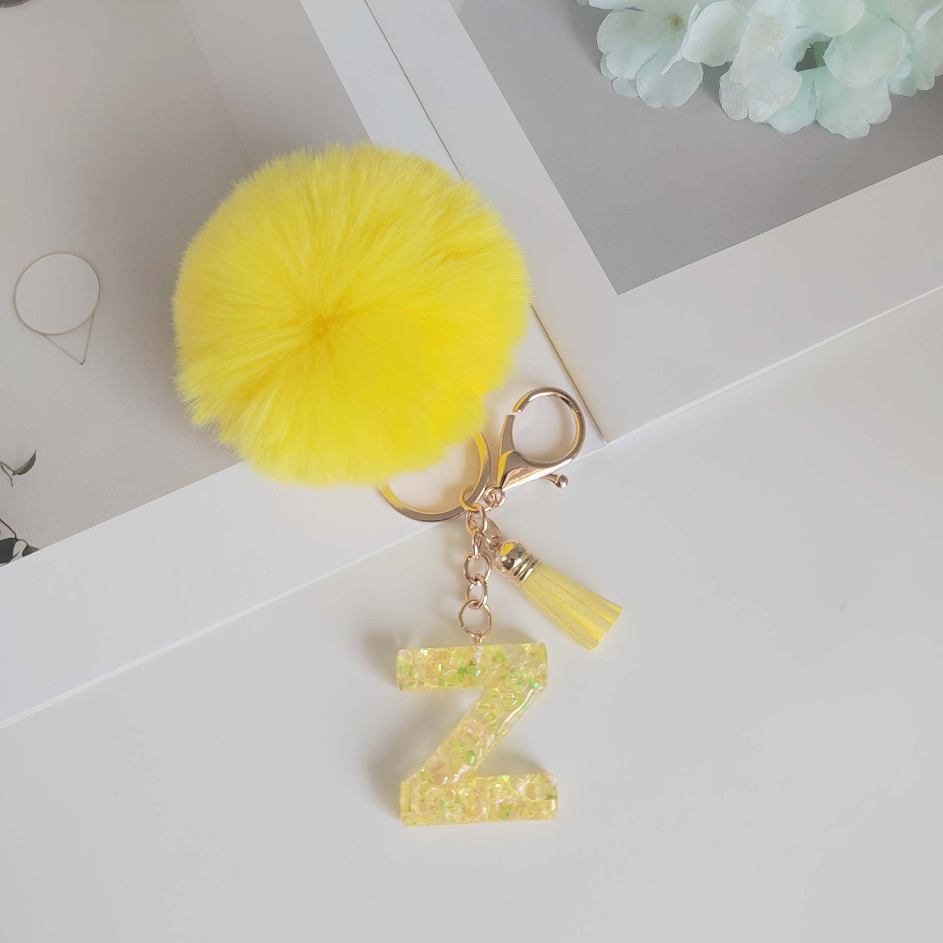 Wholesale Yellow letter ball pendant flower shaped letter keychain
