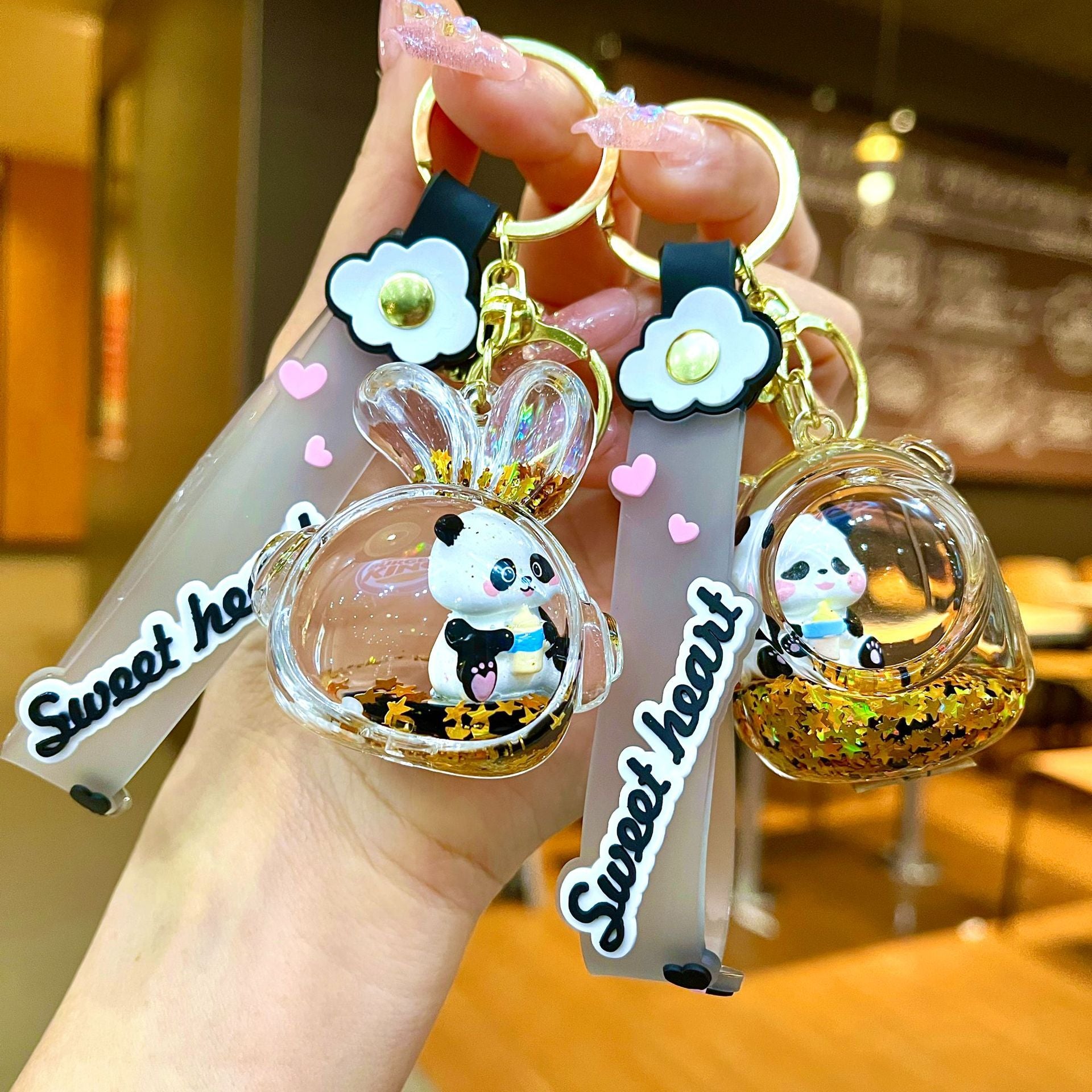 Wholesale Black gold floating cartoon cute panda Liquid Keychains