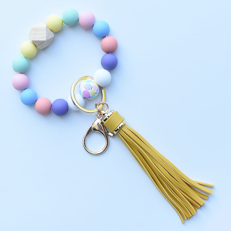 Wholesale Colorful leopard print silicone beaded bracelet keychain PU tassel pendant