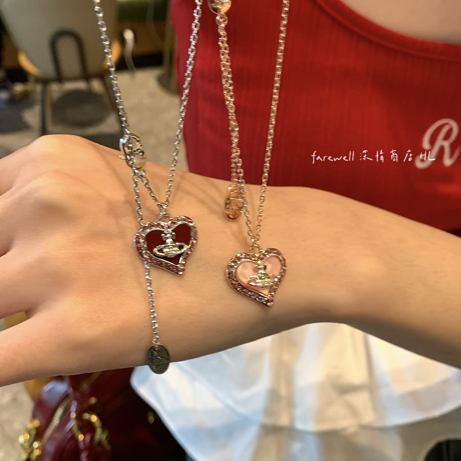 Wholesale Red pink heart-shaped Saturn necklace with built-in design