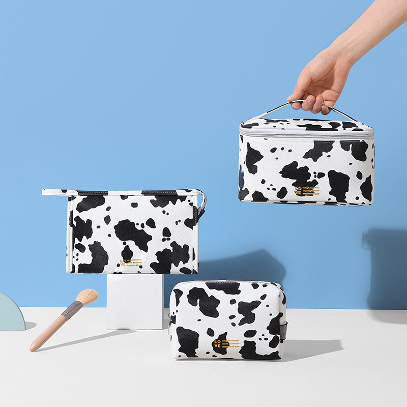 Wholesale Cow Pattern Creative Waterproof PU Storage Bag
