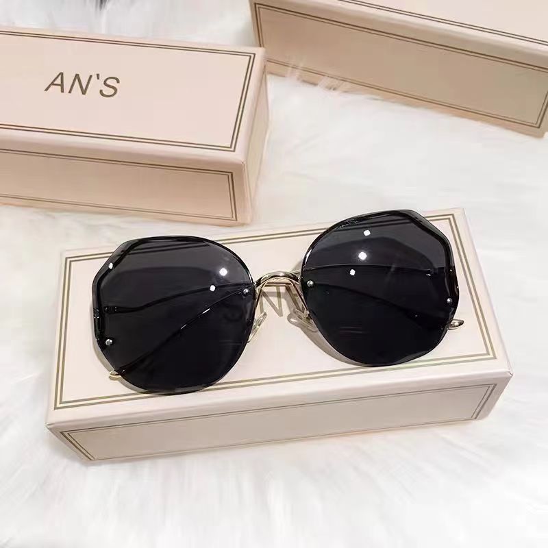 Wholesale Large framed rimless trimmed women's sunglasses