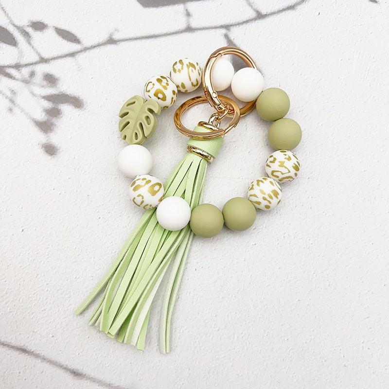 Wholesale leaf silicone printing silicone beaded tassel Wrist keychain