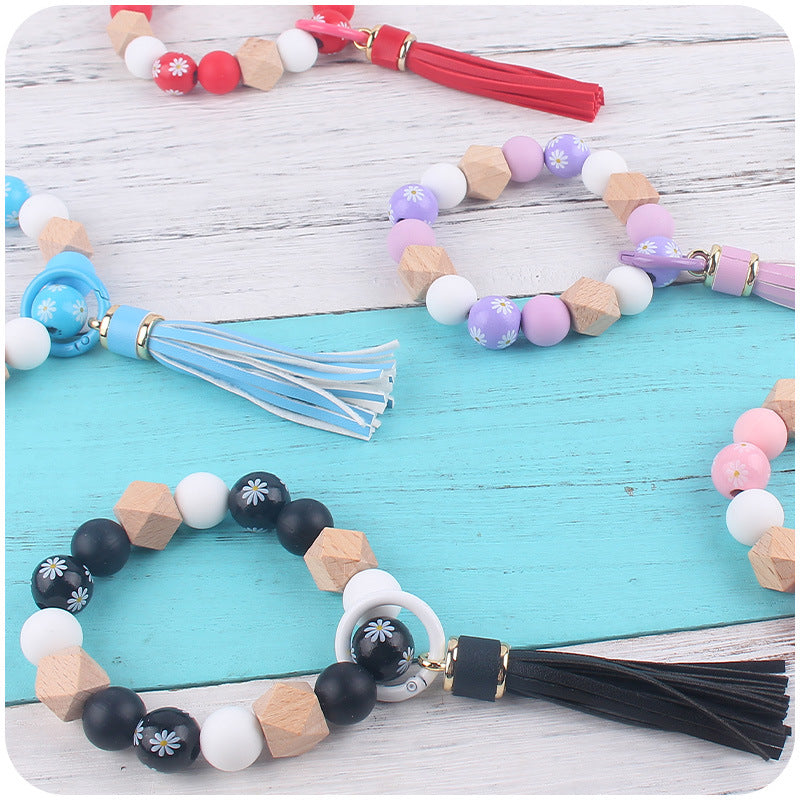 Wholesale Wooden Small Daisy Flower Leather PU Short Tassel Handmade Beaded Bracelet Keychains