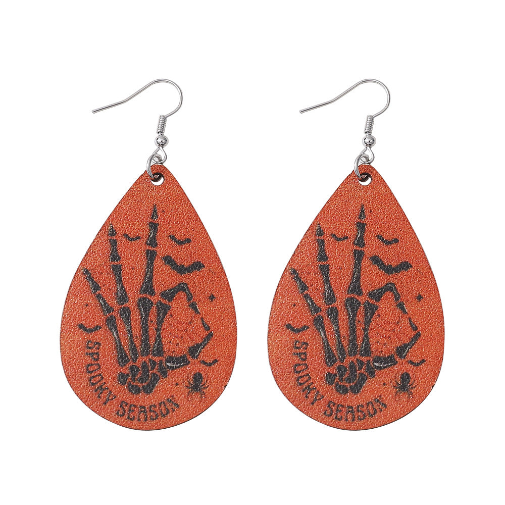 Pendientes de cuero PU de doble cara al por mayor de calavera.