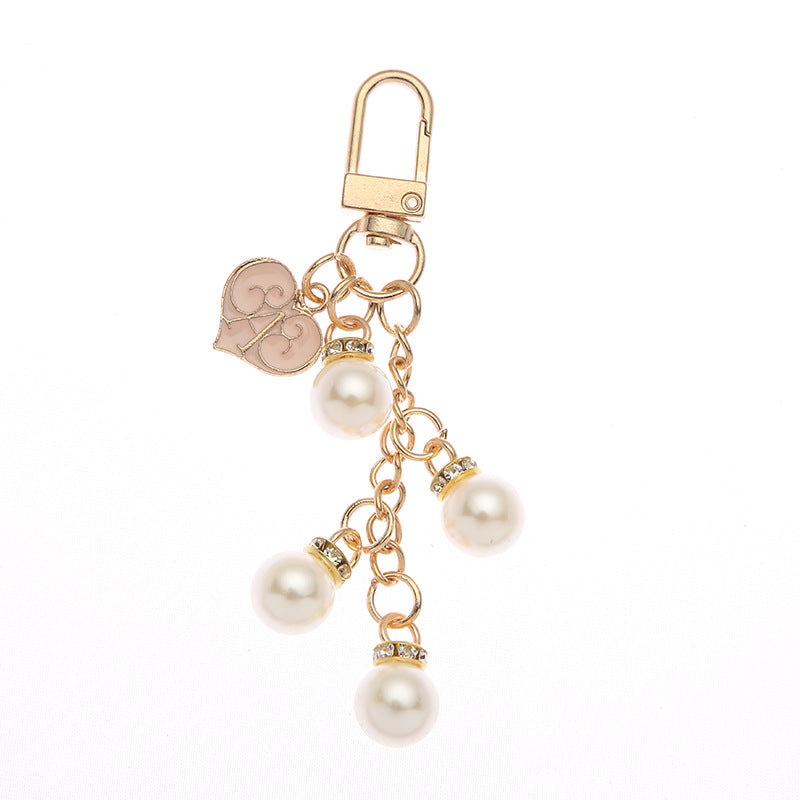 Keychanes de aleación de corazón de perla cristalina al por mayor