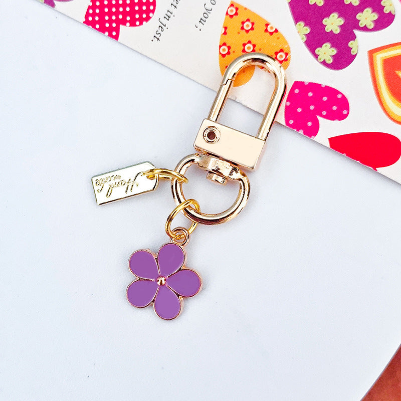 Wholesale Metal Raised Flower Keychains