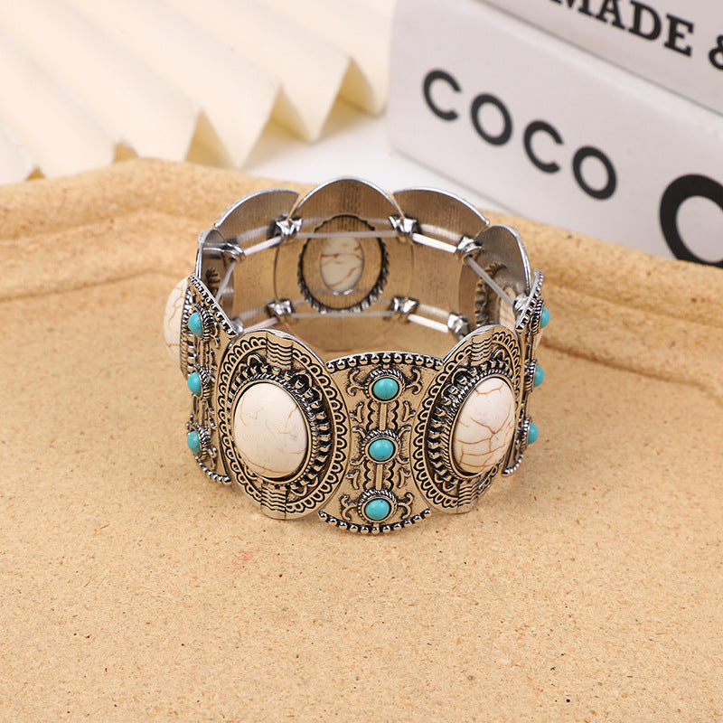 Wholesale Hollow Inlaid Turquoise Alloy Bracelet