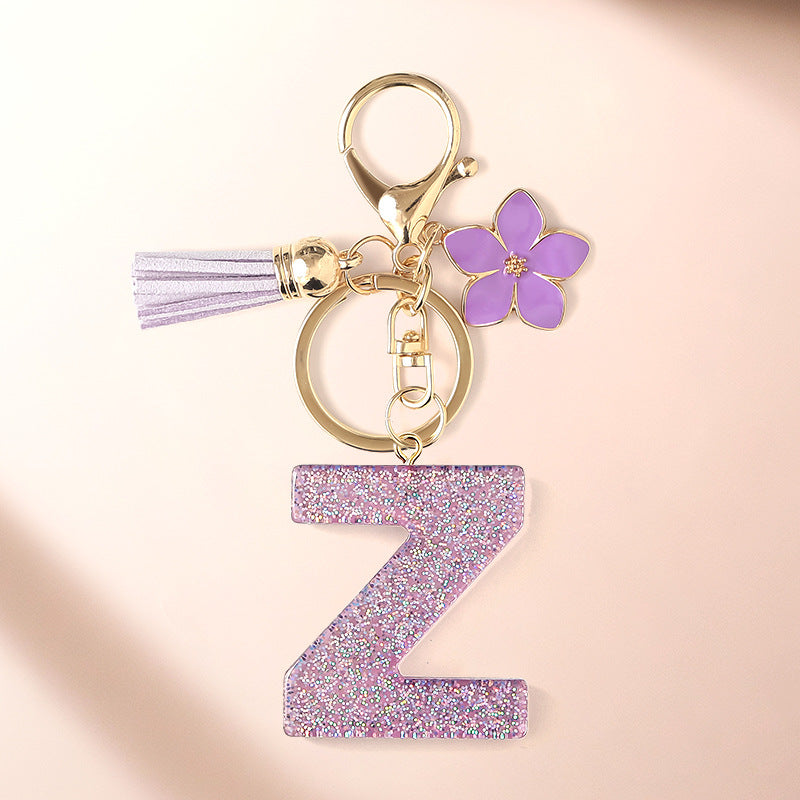 Wholesale Sparkling Pink 26 English Letter Purple Flower Keychain