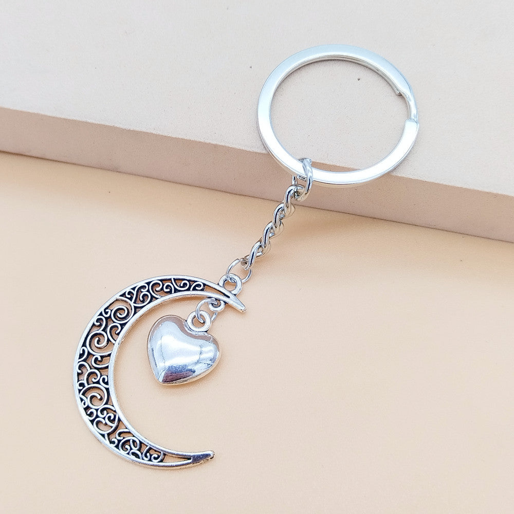 Wholesale keychain pentagram star peach heart pendant vintage sun moon combination keychain ornaments