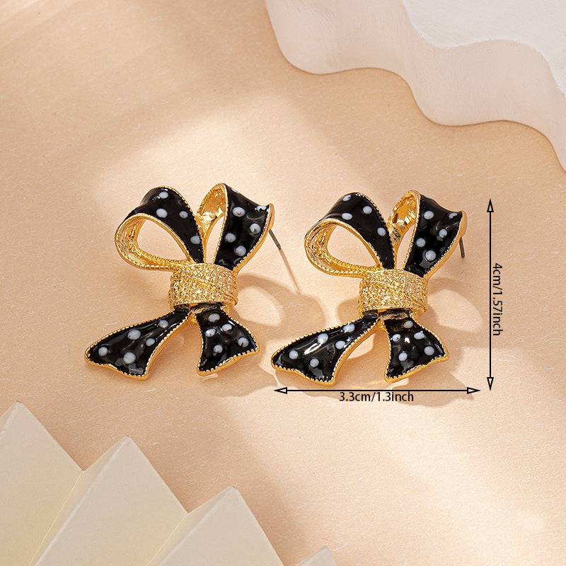 Wholesale Bow Earrings Oil Dripping Spots Zinc Alloy Earrings
