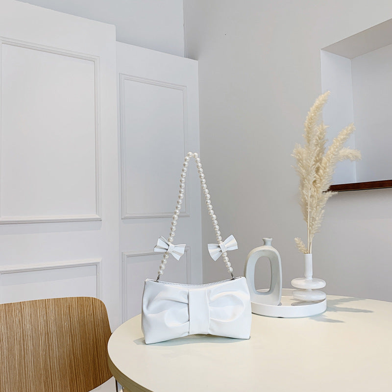 Wholesale PU Bow Fold Shoulder Bag