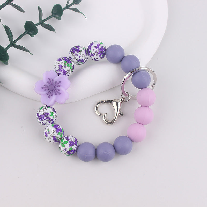 Wholesale Silicone bracelet Begonia keychain