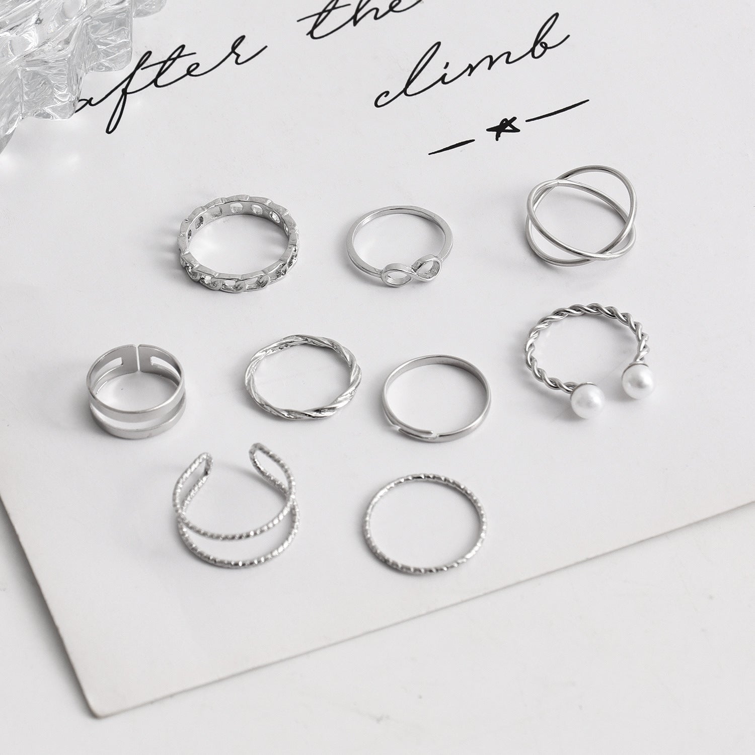 Wholesale Hollowed Out Geometric Wave Shaped Pearl Opening 9-piece Set of Rings