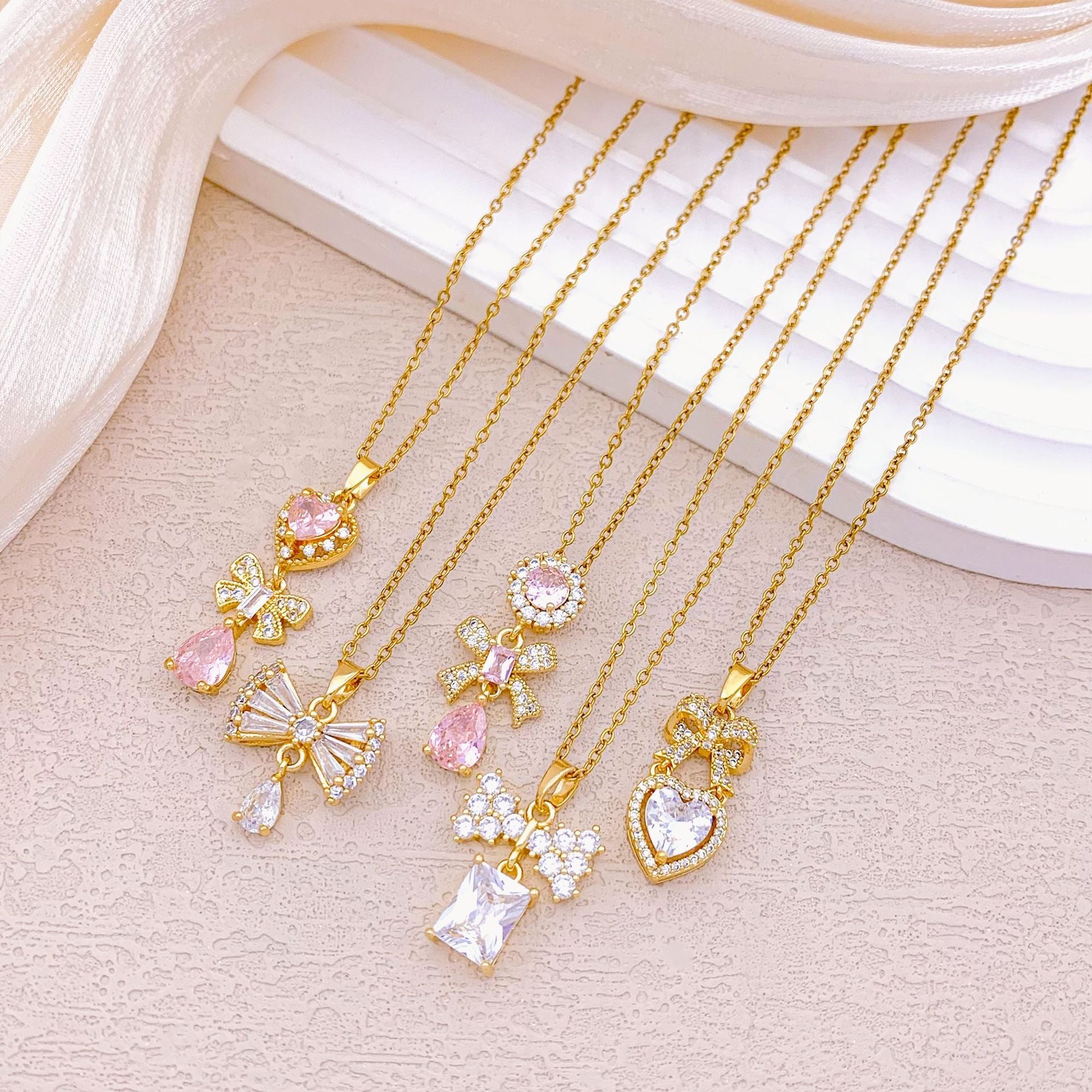 Wholesale Pink heart-shaped bow with diamond studded titanium steel necklace