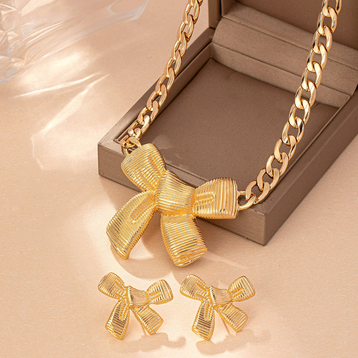 Wholesale Bow Pendant Necklace and Bow Stud Earrings Jewelry Set