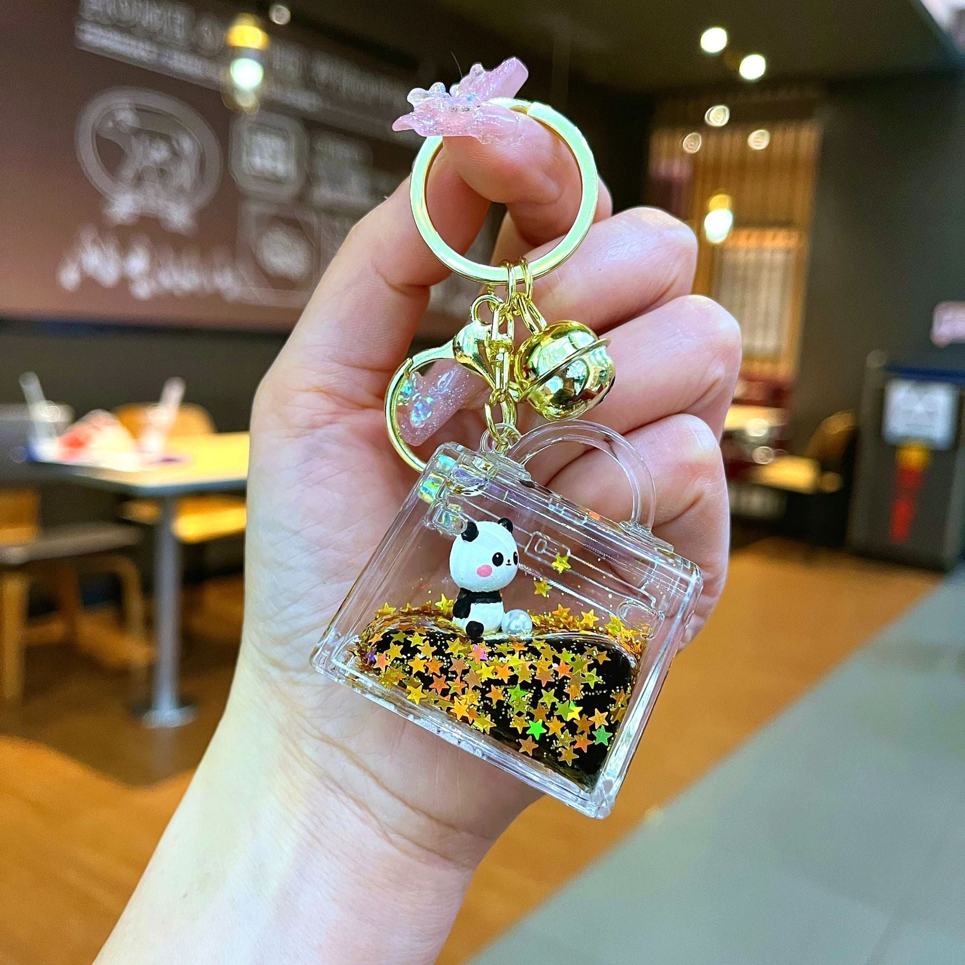 Wholesale Black gold floating cartoon cute panda Liquid Keychains
