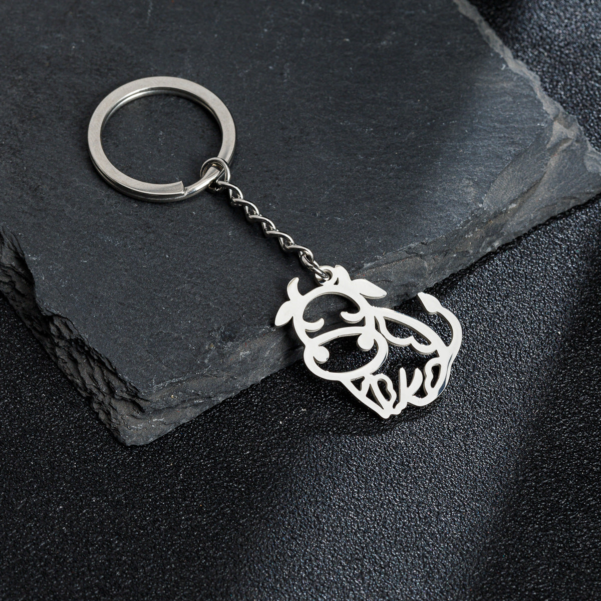 Wholesale Stainless Steel Hollow Cute Cartoon Calf Keychain