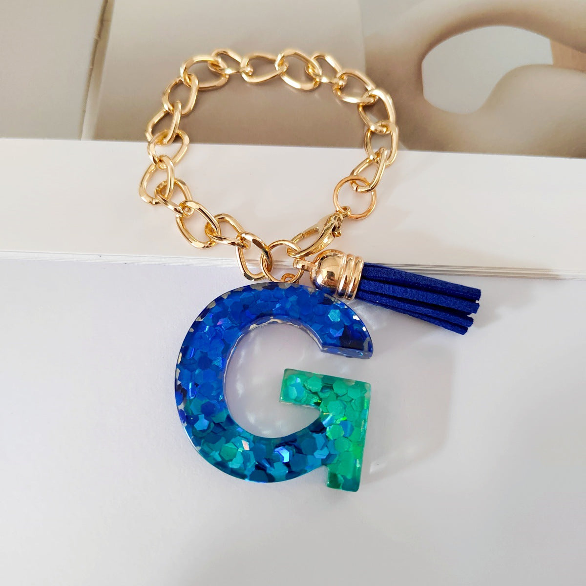 Wholesale Mixed color blue English letter keychain