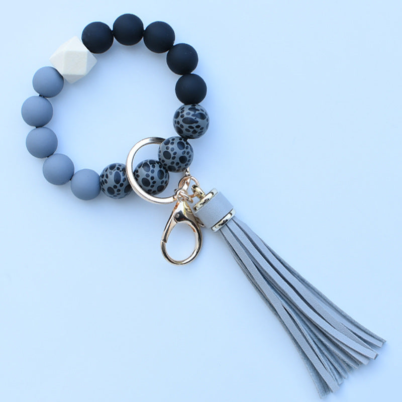 Wholesale Colorful leopard print silicone beaded bracelet keychain PU tassel pendant