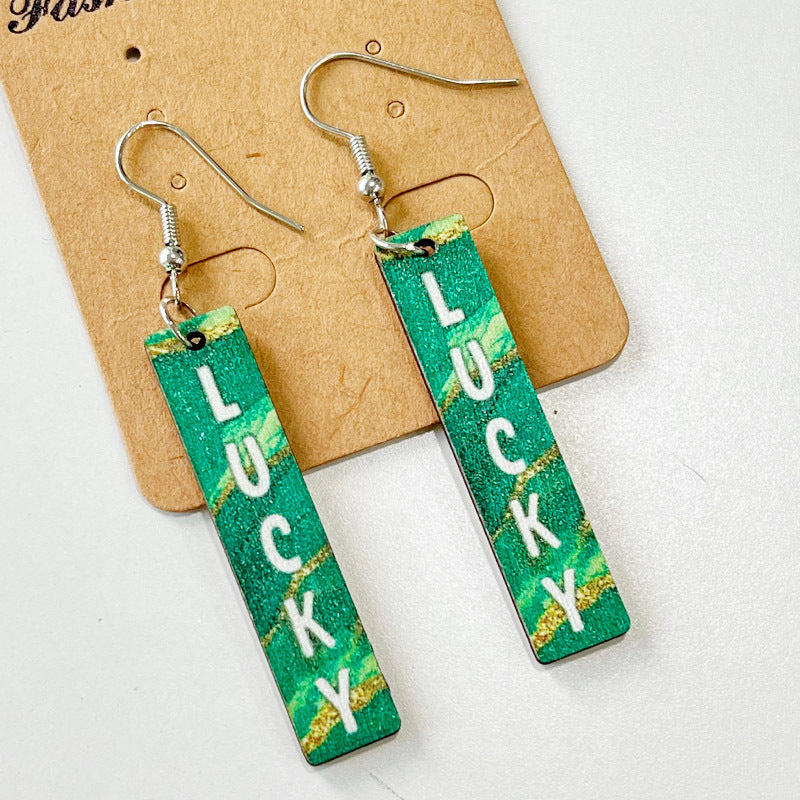 Wholesale St. Patrick's festival green March jewelry wooden simple hollow earrings