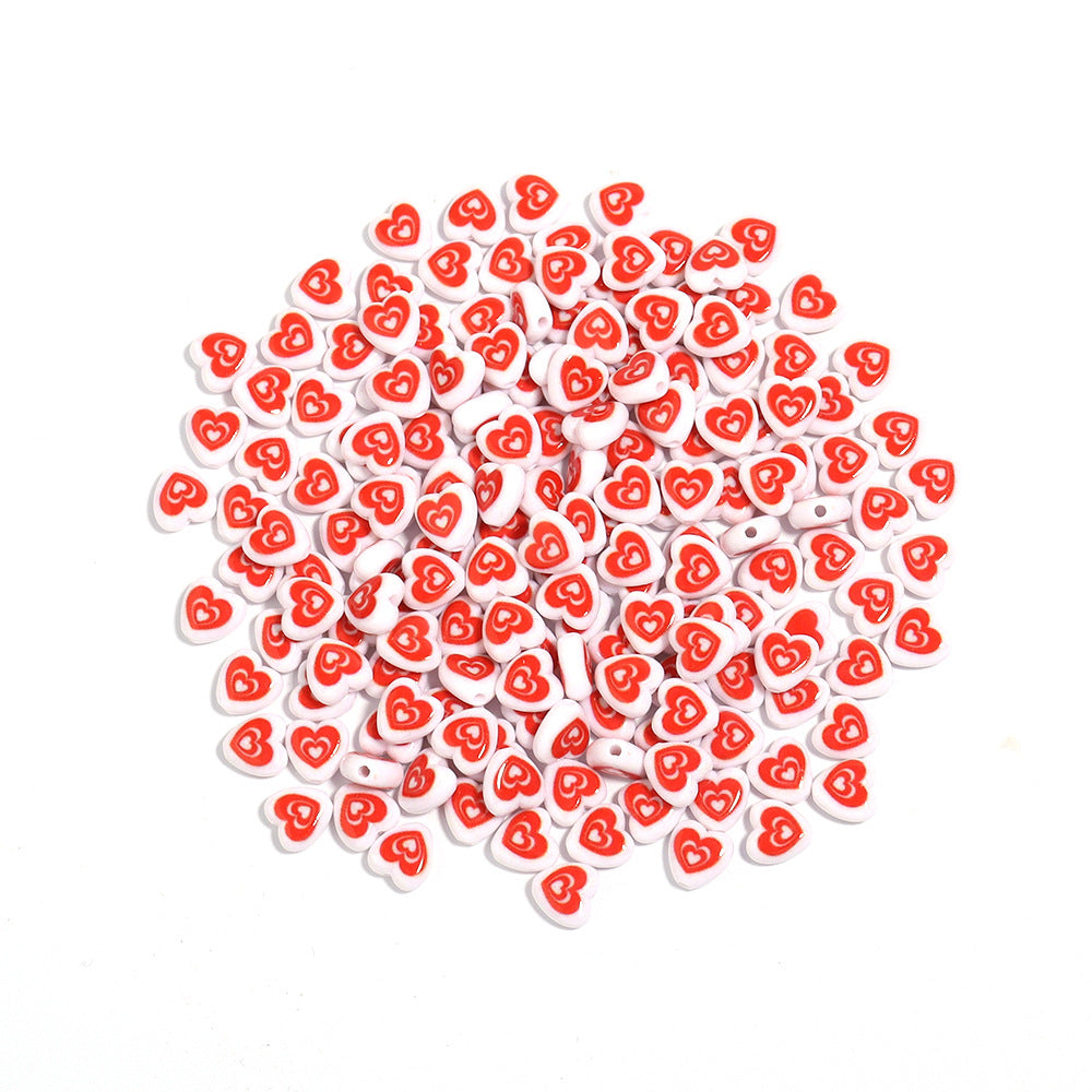 アクリル赤小サイズハート型縦穴ルースビーズ 100 個/パックの卸売