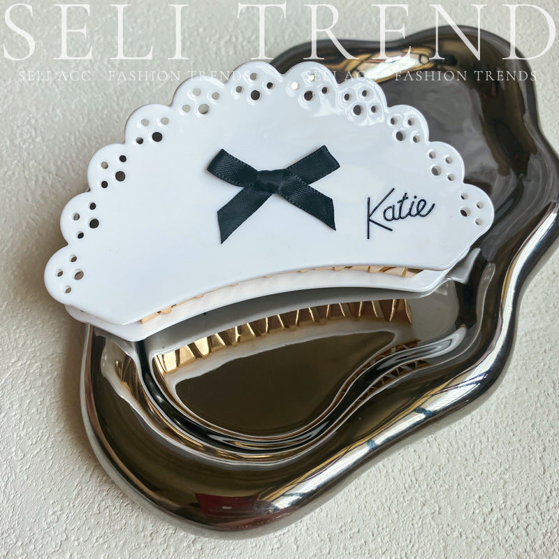 Wholesale Sweet and Cool Bow Hollow Letter Clip