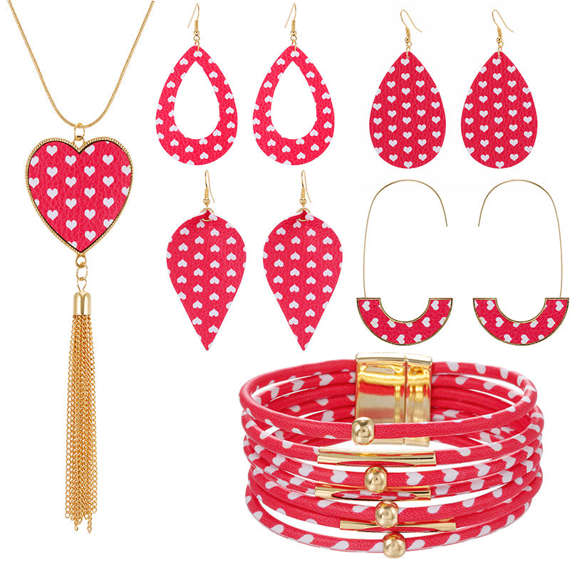 Conjunto de brazalete de arete de cuero de la serie de amor rosa al por mayor