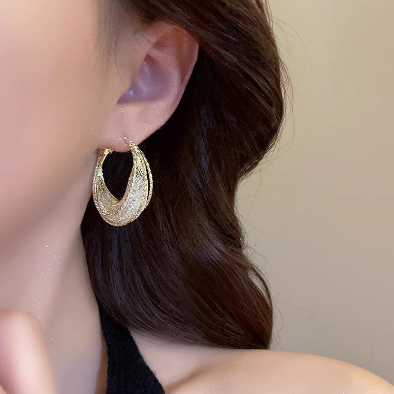 Wholesale S925 Metal Hollow Earrings