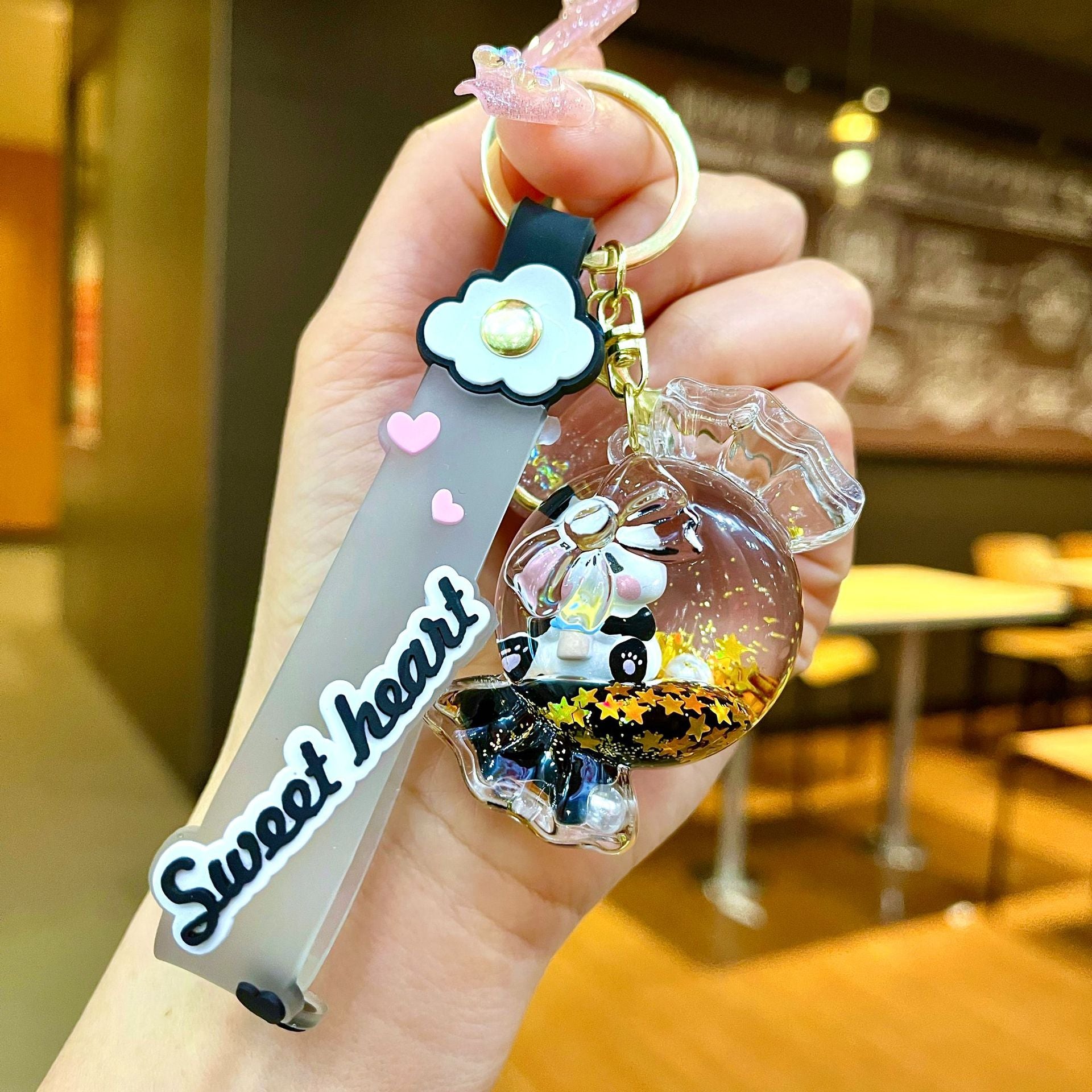 Wholesale Black gold floating cartoon cute panda Liquid Keychains