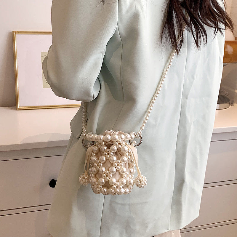 Wholesale Fresh and sweet pearl woven small bag fashionable and stylish handbag