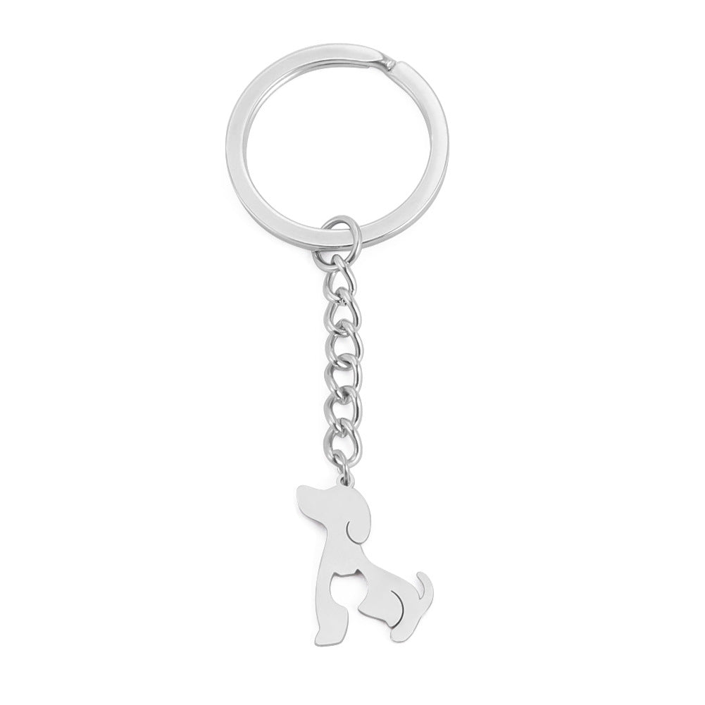 Titanio de titanio al por mayor Hollow Dog Cat Keychain