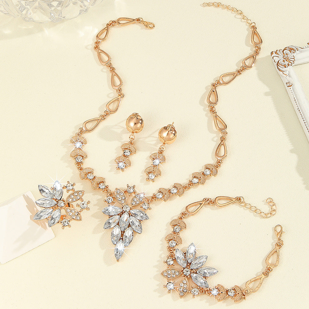 Wholesale Fashionable and Exaggerated Diamond-Encrusted White Marquise Necklace  Earrings Ring  and Bracelet Four-Piece Jewelry Set