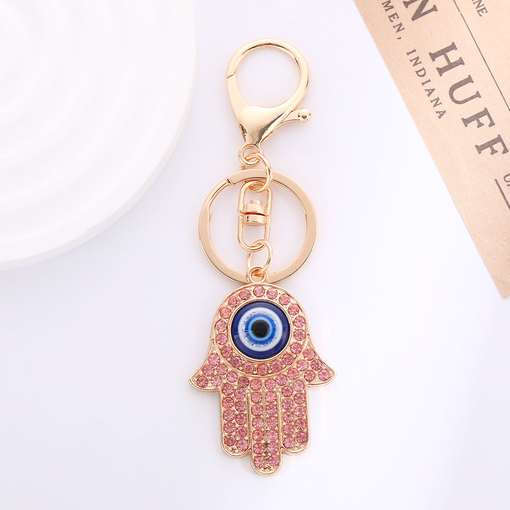 Wholesale Palm Devil' s Eye with Water Diamond Metal Keychain