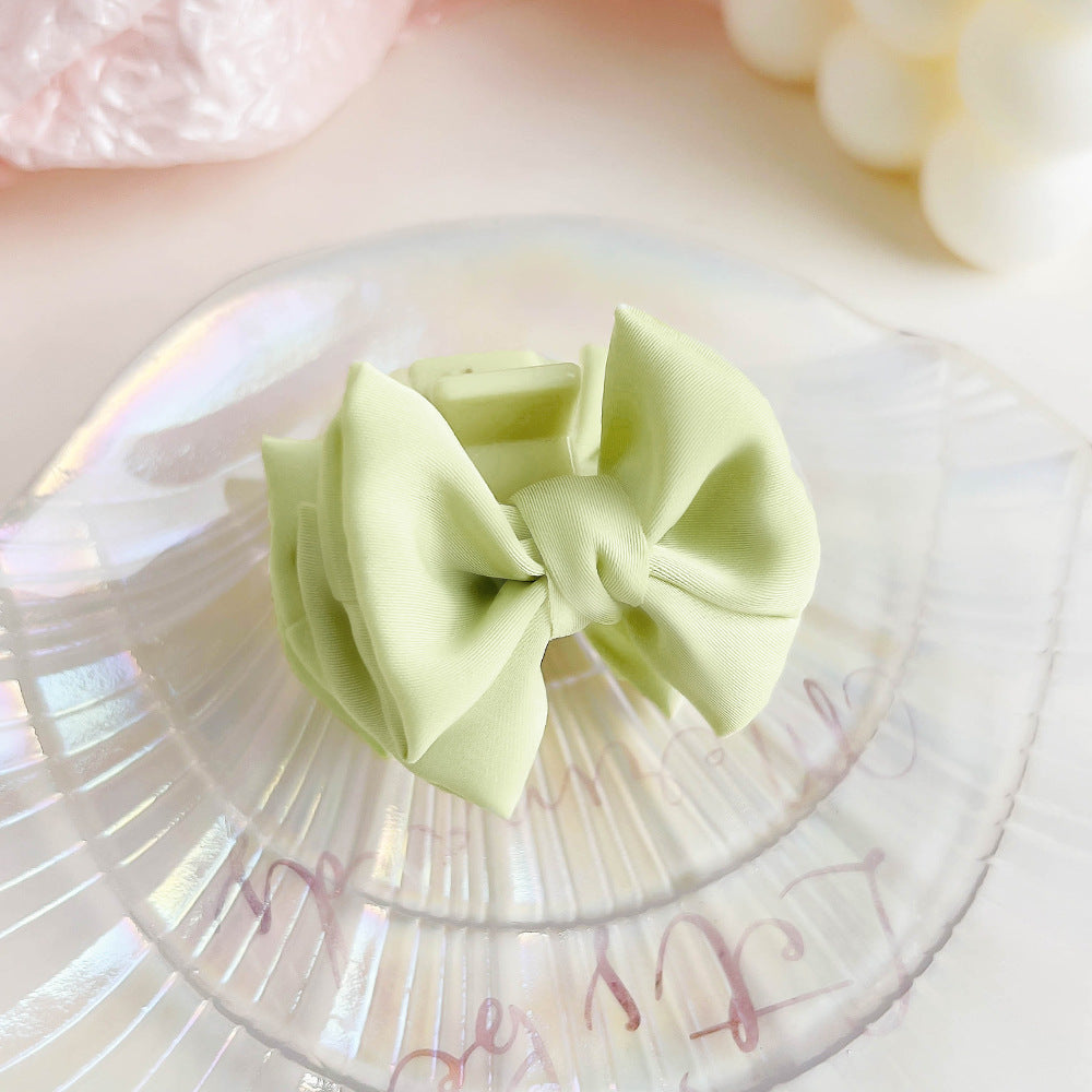 Tela al por mayor Bowknot clip de agarre pequeño