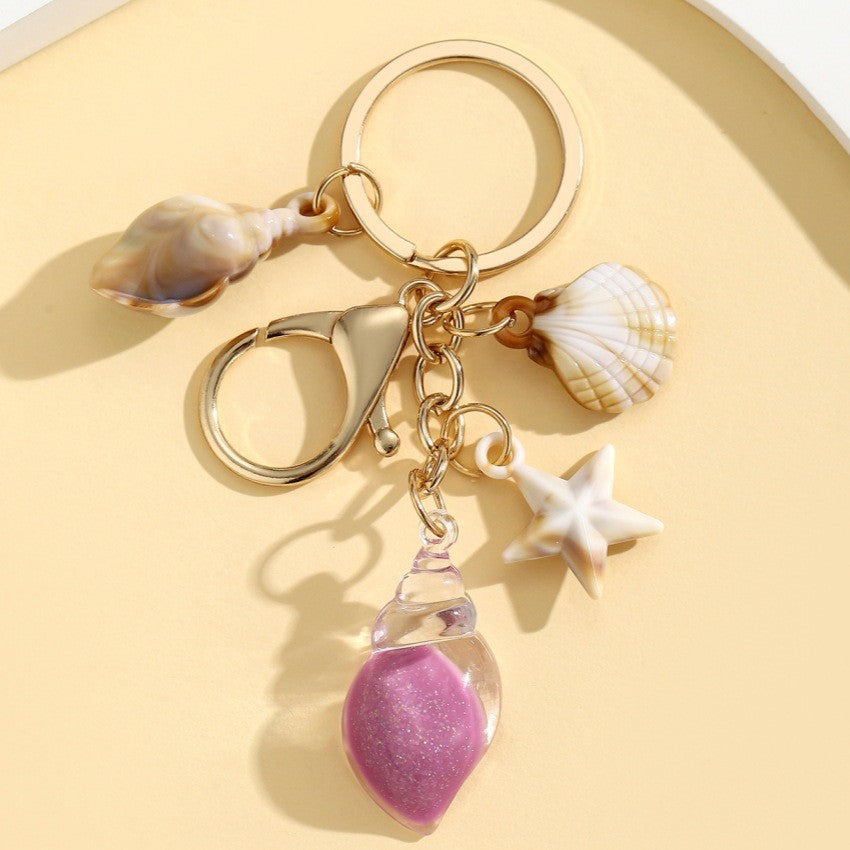 Wholesale Seaside vacation luminous conch Acrylic keychain