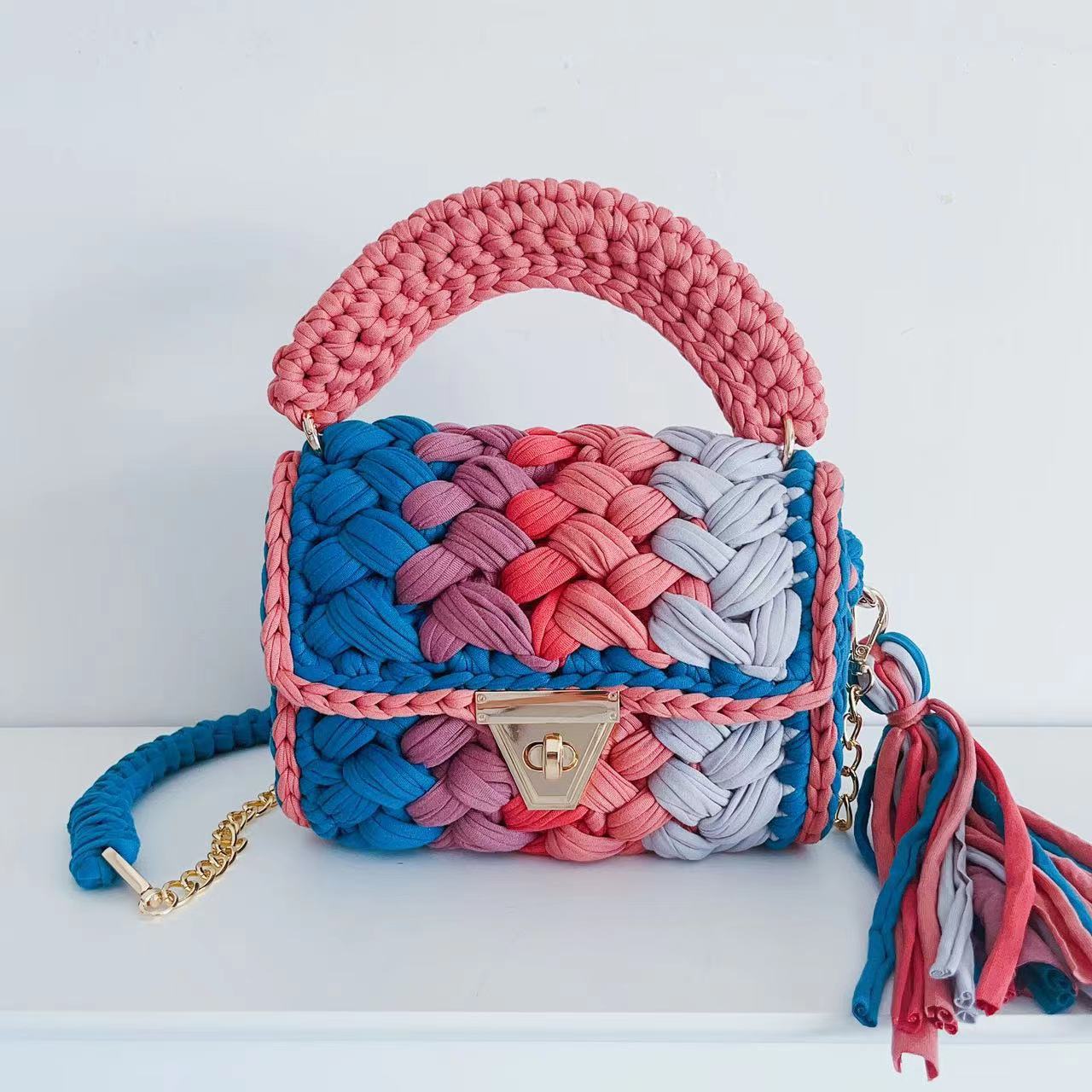 Wholesale Handmade Polyester Woven Handbags with Colored Chain Strips and Diagonal Cross Shaped Handbags